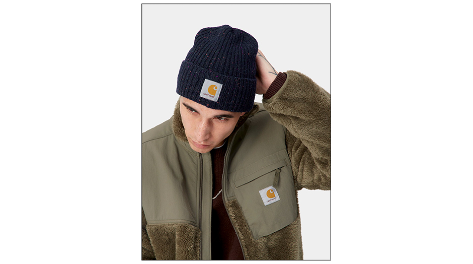 man with anglistic carhartt beanie