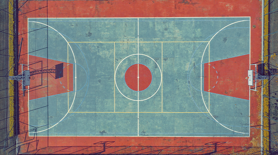 basketball court with hoops at the ends