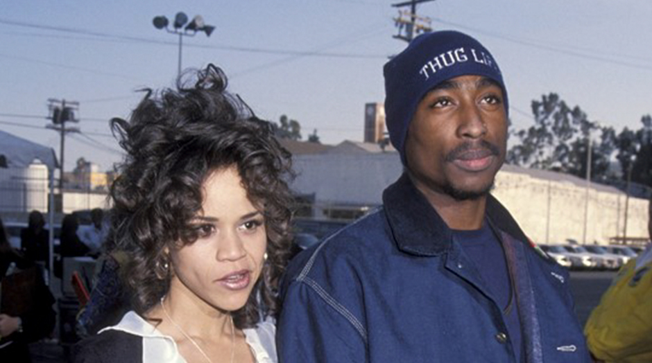 tupac in the 90's wearing carhartt